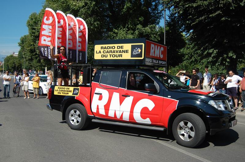 RMC in the Tour de France 2008, we can clearly see on the car that this is the 'radio de la caravane du Tour'