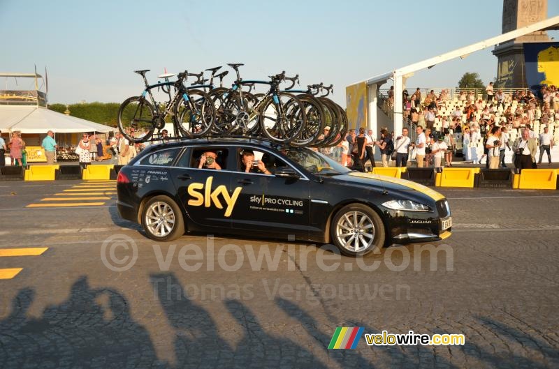 The Team Sky car in the colours of the yellow jersey