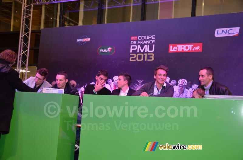 The cyclists are ready for the autograph session
