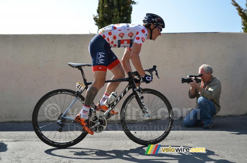 Sylvain Chavanel (IAM) gets away in the first climb to the finish