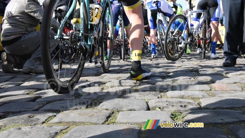 The riders get ready for kilometers of cobble stones!