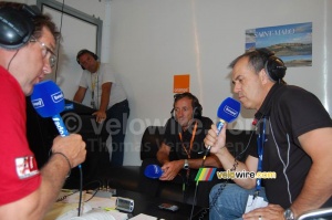 Eric Caritoux & Vincent Lavenu (AG2R La Mondiale) being interviewed by Vincent Barteau (Europe 1) (493x)