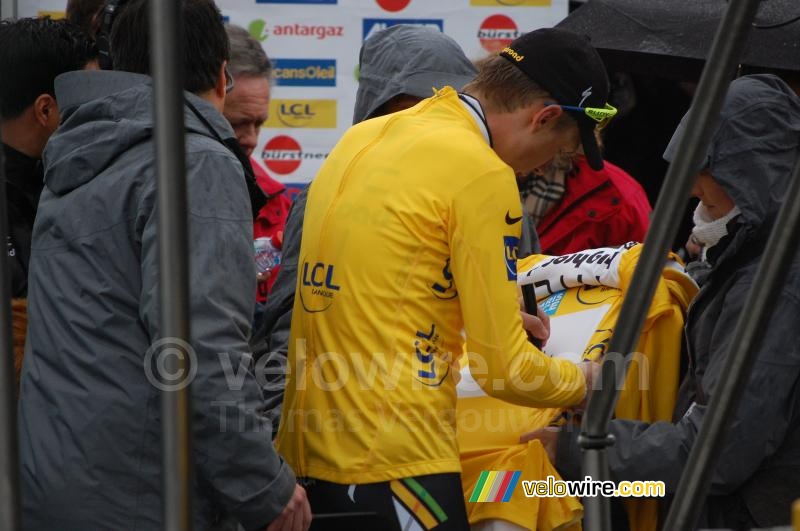 Tony Martin (HTC-Highroad) signs some yellow jerseys