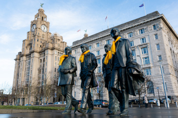 The statue of the Beatles dressed up with yellow scarves - © ASO/SWpix