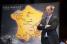 Christian Prudhomme poses next to the Tour de France 2013 map (2) (456x)