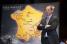 Christian Prudhomme poses next to the Tour de France 2013 map (2) (801x)