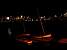 Little boats in front of Boston by night (211x)