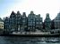 Image typique d'Amsterdam avec les maisons enfoncées (150x)
