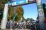 The peloton under the start arch in Authon-du-Perche (481x)