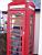 Cédric in an English phone booth (163x)