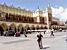 Virginie in front of the market (cloth hall) in Krakow (162x)