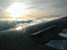 Clouds and the sun seen from the plane (267x)