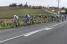 The peloton in a long single line just outside Saint Fiacre (394x)