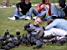 Place des Vosges: a boy under a lot of pigeons (406x)
