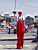 La Vache Qui Rit man on stilts (756x)