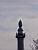 A bird on one of the 'Colonnes du Trne' (Place de la Nation) (417x)