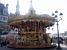 A merry-go-round in front of the Htel de Ville (586x)