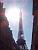 The Eiffel Tower next to the sun (487x)
