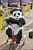 A panda on a bicycle in the Village Départ ! (1118x)
