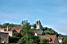 A castle with the typical roofs of the area around Beaune (607x)