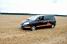 A Orange car in the middle of a big field! (500x)