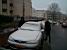 Our car with my parents in the snow (592x)