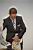 Mathieu Drujon does a magic trick with a newspaper (2) (807x)