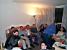 [Housewarming Florent]: from left to right Grace, Marie, Stefan, Sébastien, Cédric, Bernard, Virginie, Fabian, Florent, Anne-Cécile and Olivier sitting on the floor (274x)