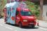 A Vittel water pack on the road (438x)