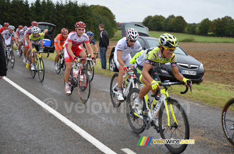 The peloton in the feeding zone with Giovanni Visconti