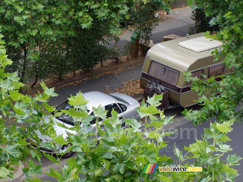 The car and caravan of my parents seen from my appartment