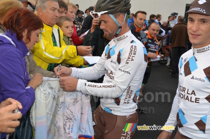 Jimmy Casper (AG2R La Mondiale) signs a jersey