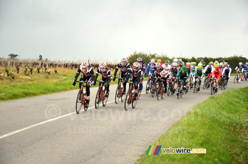 The peloton is following behind