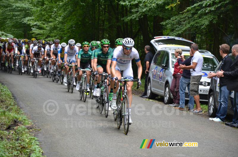 Tom Stamsnijder (Argos-Shimano) leading the peloton in the forest of Nédonchel