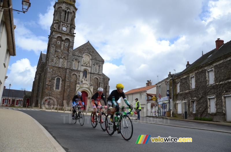 Delayed riders at the church of Saint-Fiacre