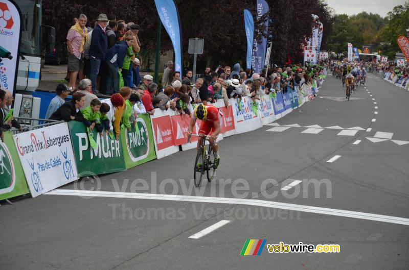 Adrien Petit (Cofidis) tries to resist to the peloton