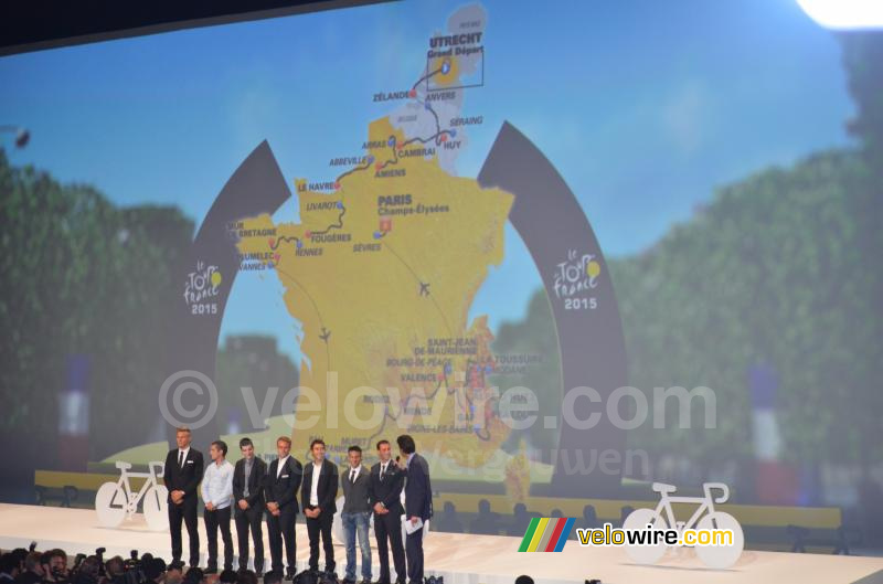 The riders in front of the map of the Tour de France 2015