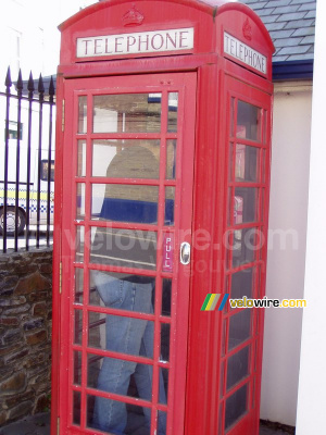 Cédric in an English phone booth (507x)