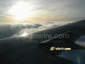 Clouds and the sun seen from the plane (213x)