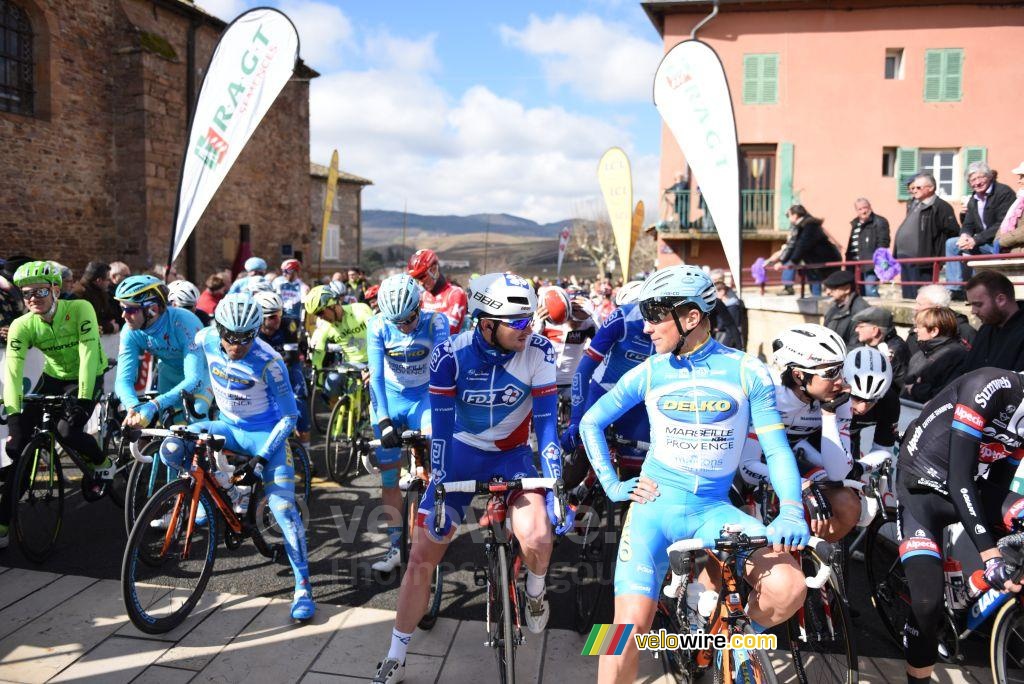 The riders enjoy the sun at the start