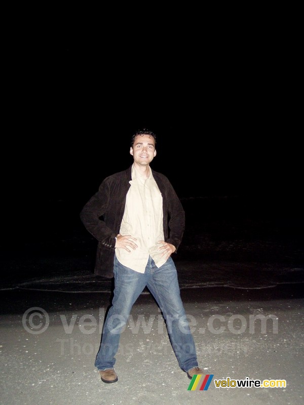 Romain on the beach at night