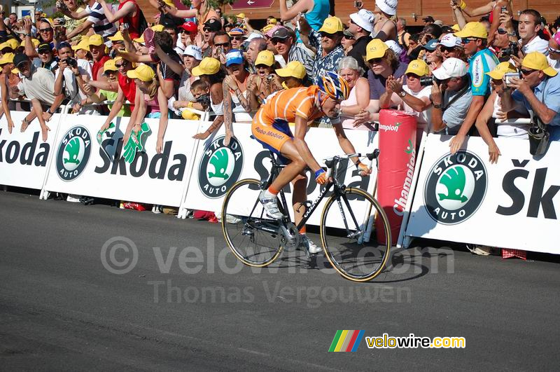 Michael Rasmussen, stage winner, at the finish in Tignes