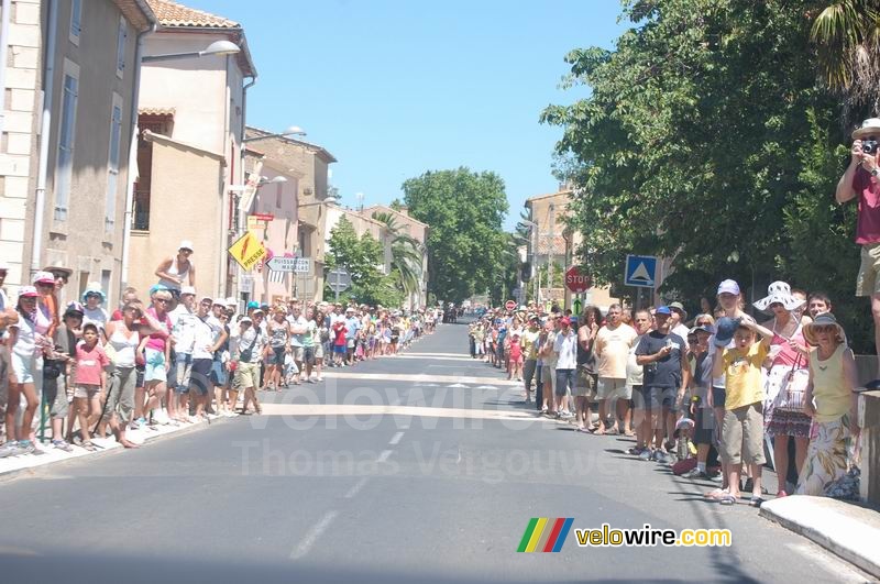 Many spectators on the road side during this stage