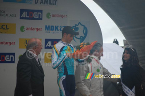 Alberto Contador (Astana) watches the flowers for the stage winner (793x)