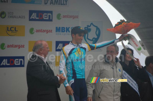 Alberto Contador (Astana) with the flowers and the medal for the stage winner (1080x)