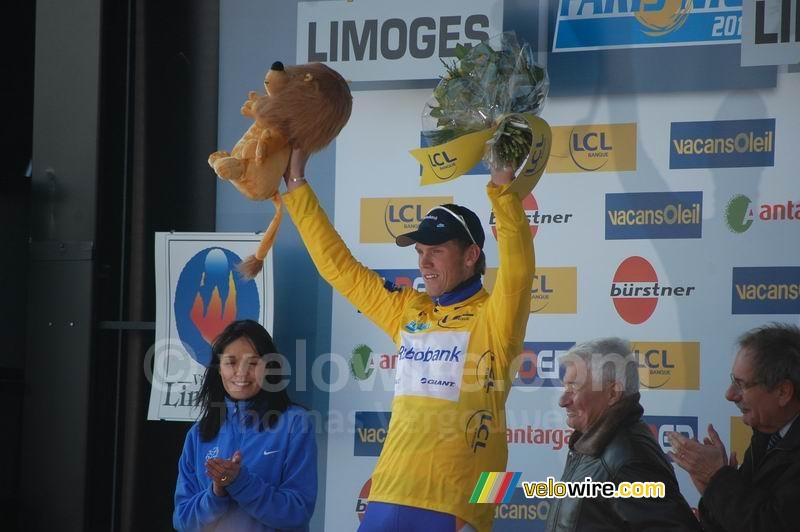 Lars Boom (Rabobank) received the yellow jersey, handed out by Raymond Poulidor