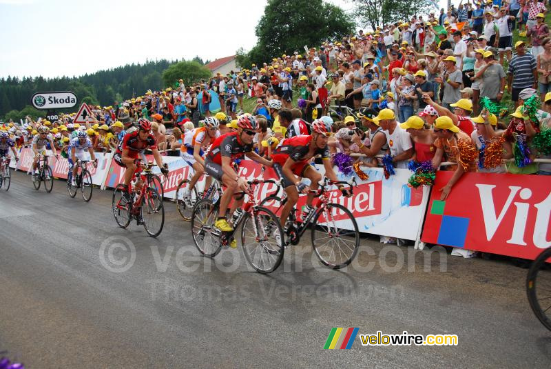 Chris Horner pushes Janez Brajkovic (Team Radioshack)