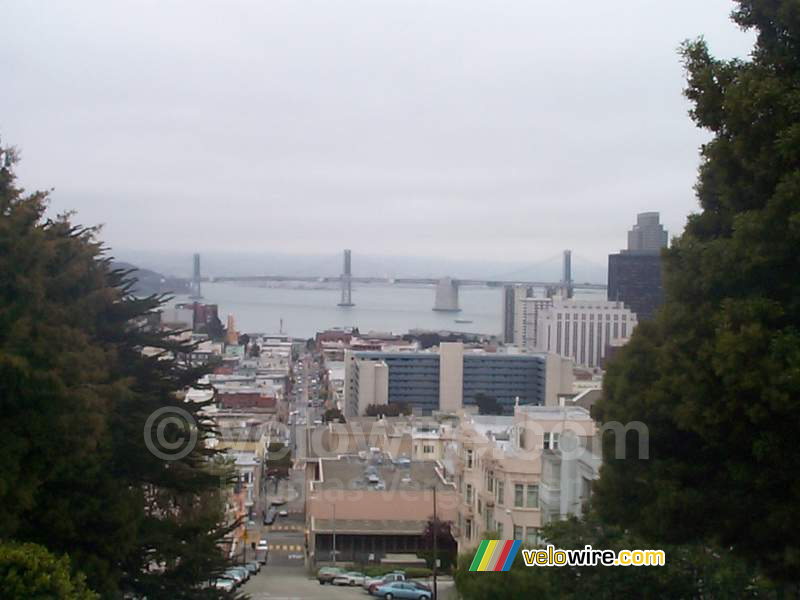 [San Francisco] - The city with the Bay Bridge on the second plan